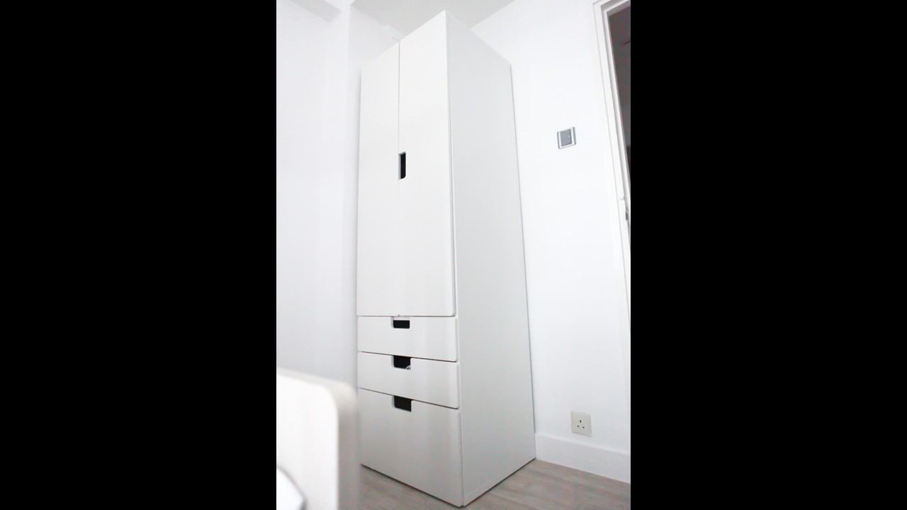 Queen size bed with white wardrobe combination in Fortress Hill 2 bedrooms apartment