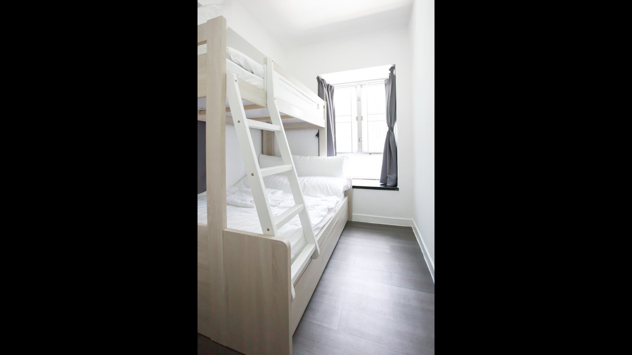 Bunk bed ( double bed  size) facing windows in Fortress Hill 2 BR apartment