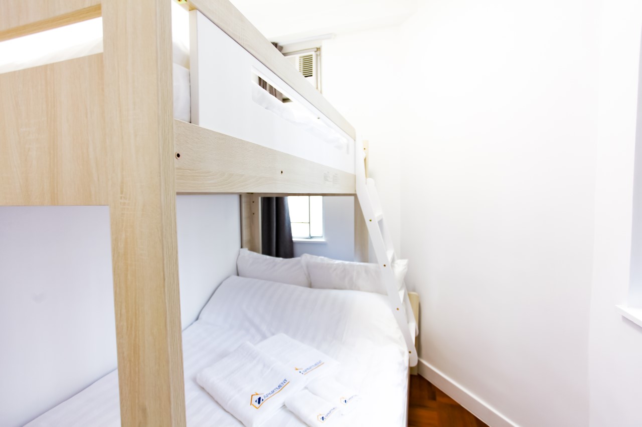 Bunk bed facing window in Fortress Hill 2 bedrooms Apartment