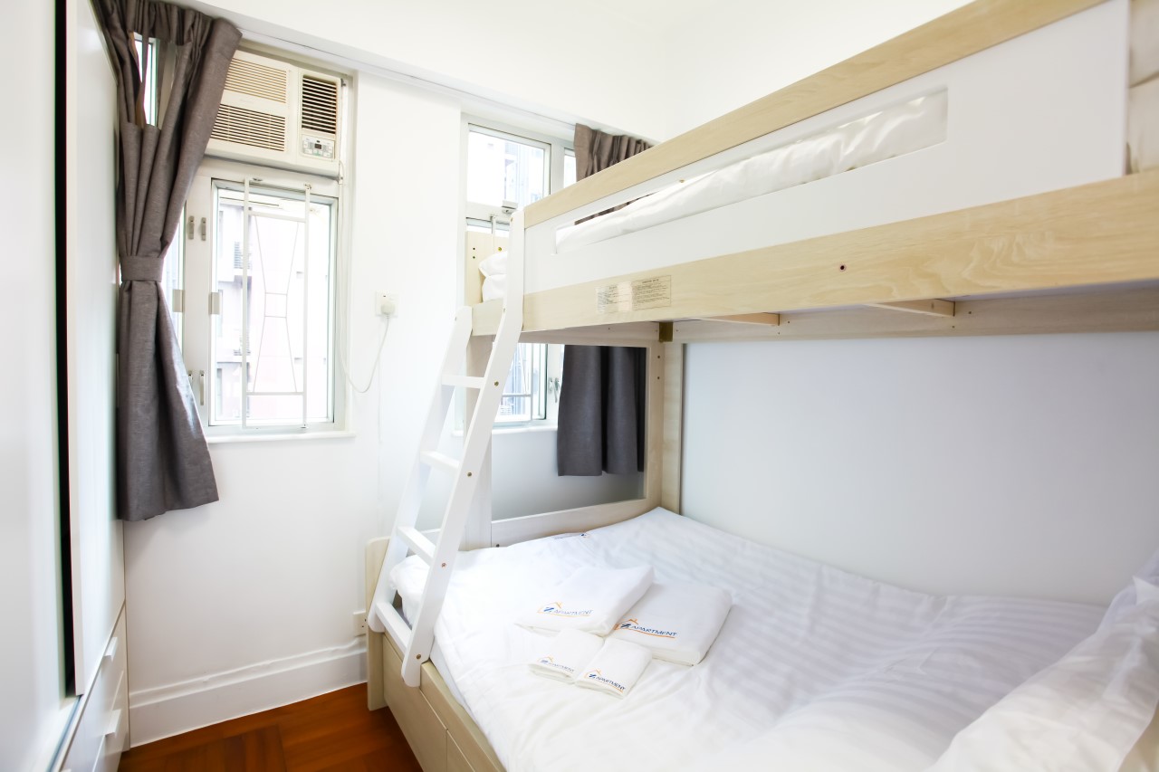 Bunk bed with white wardrobe in Tin Hau 2 BR Apartment