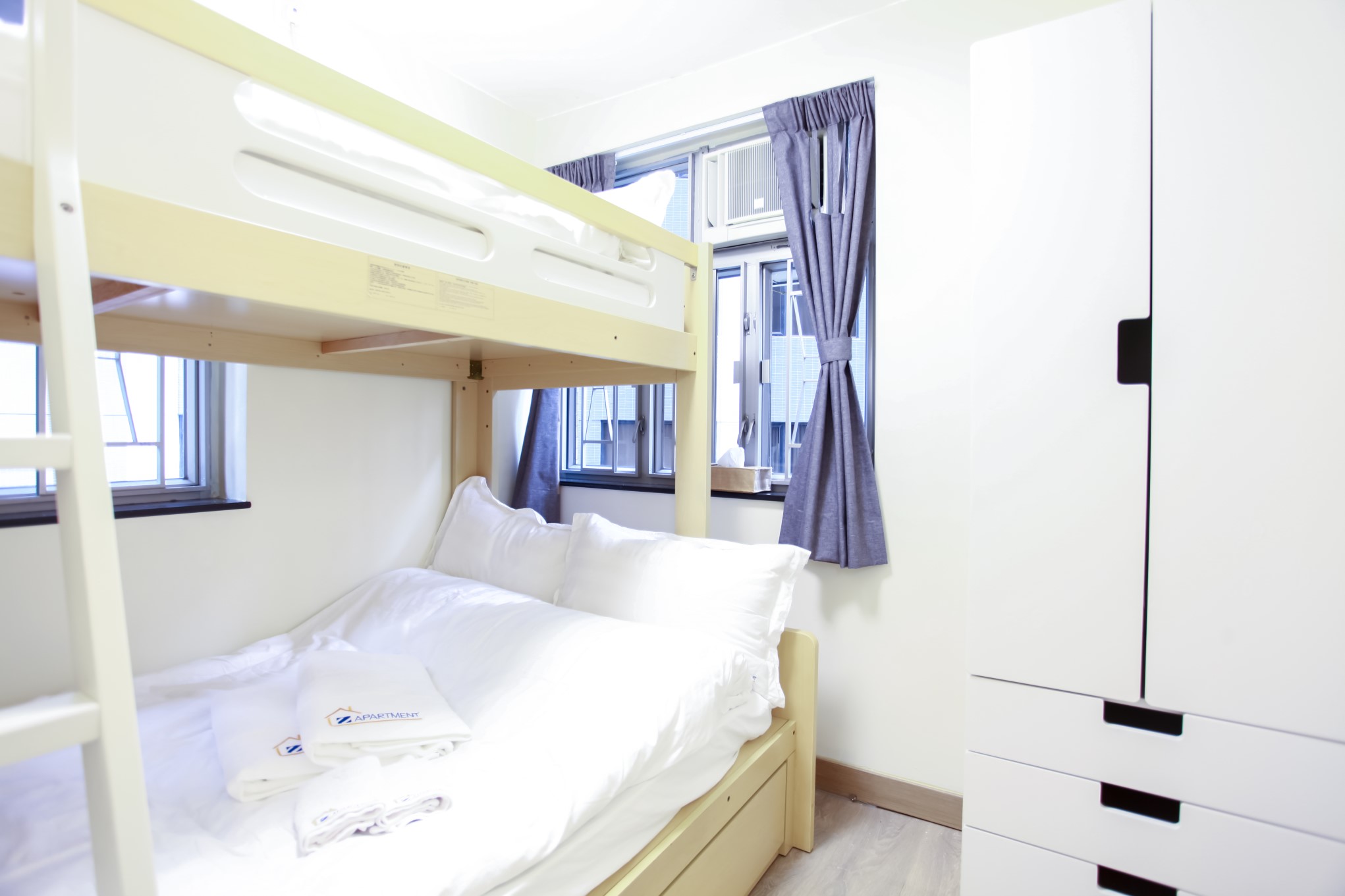 Bunk bed with white wardrobe combination in Fortress Hill 2 BR apartment