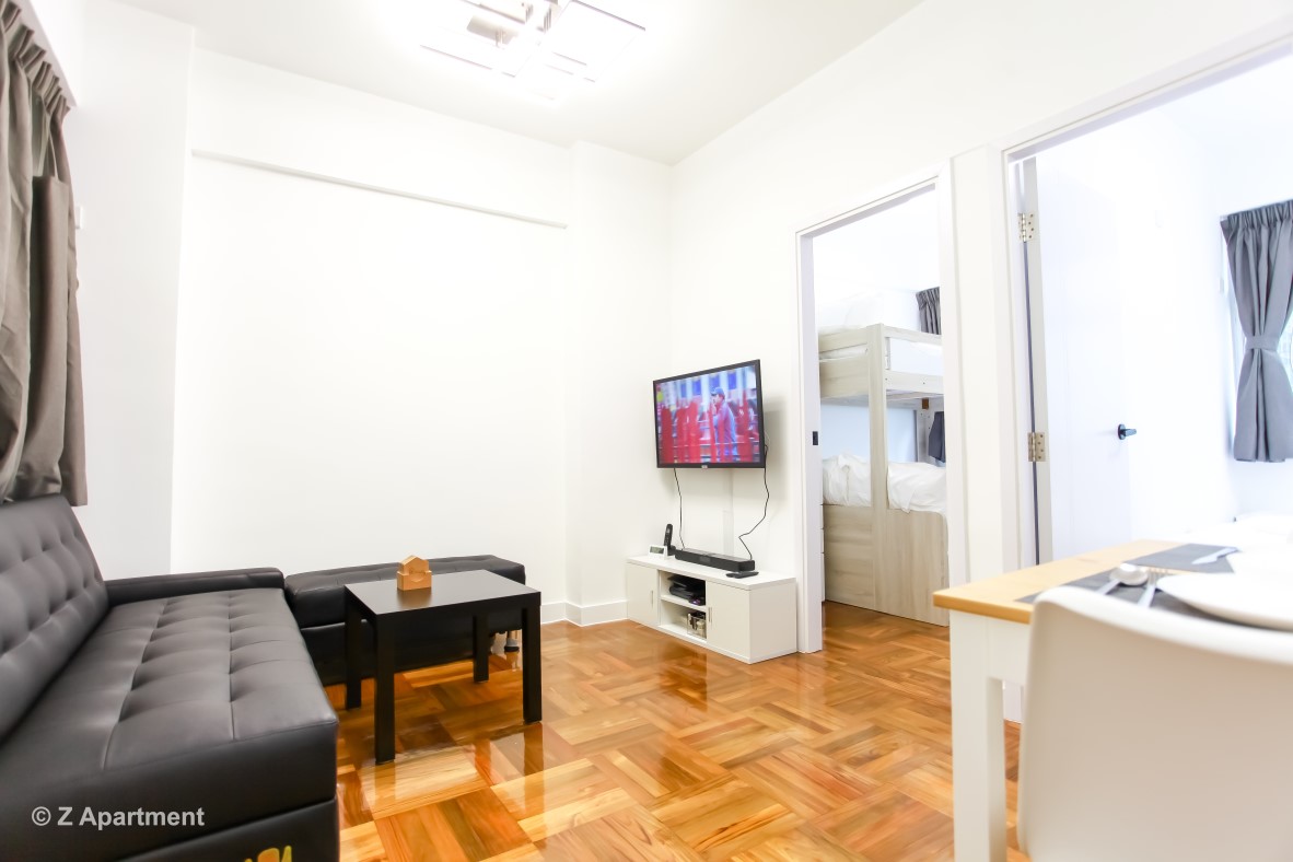 2 bedrooms Hong Kong serviced apartment in Fortress Hill with sofa bed, tv, dining table