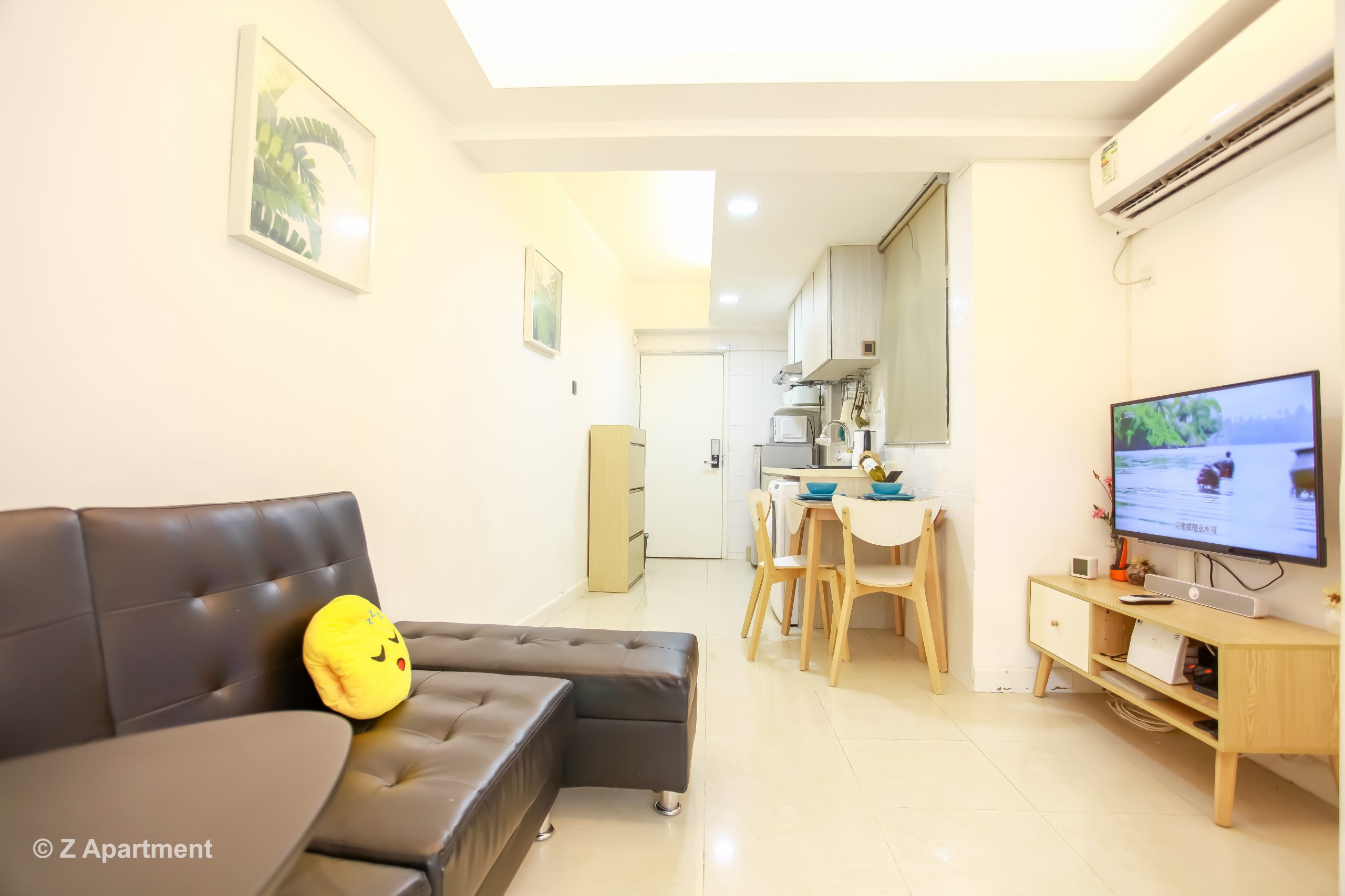 2 bedrooms Hong Kong serviced apartment in quarry bay with sofa bed, tv, dining table